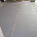 Bare Concrete After Carpet Removal