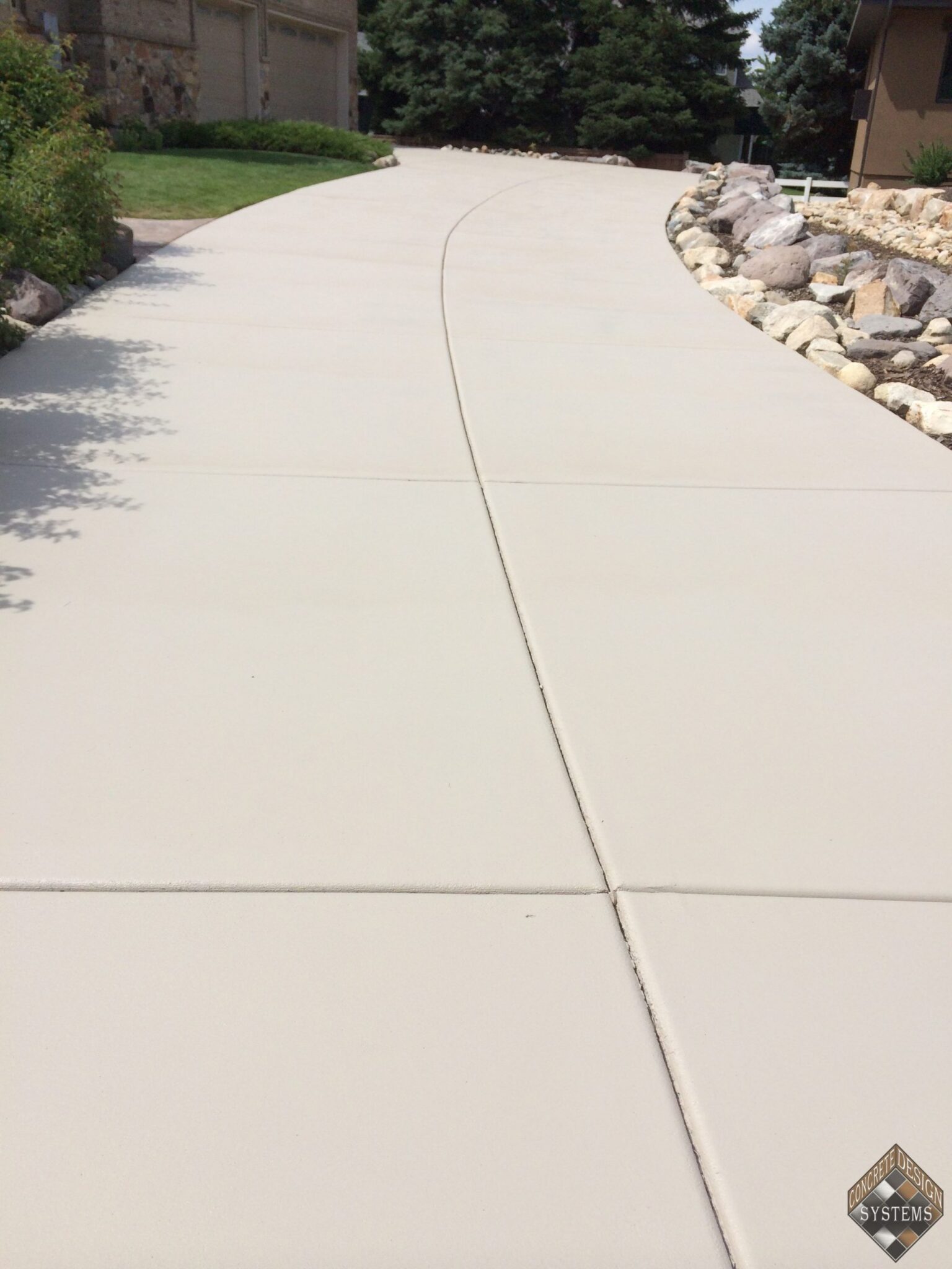 Bone-Solid-Color-Stained-Driveway