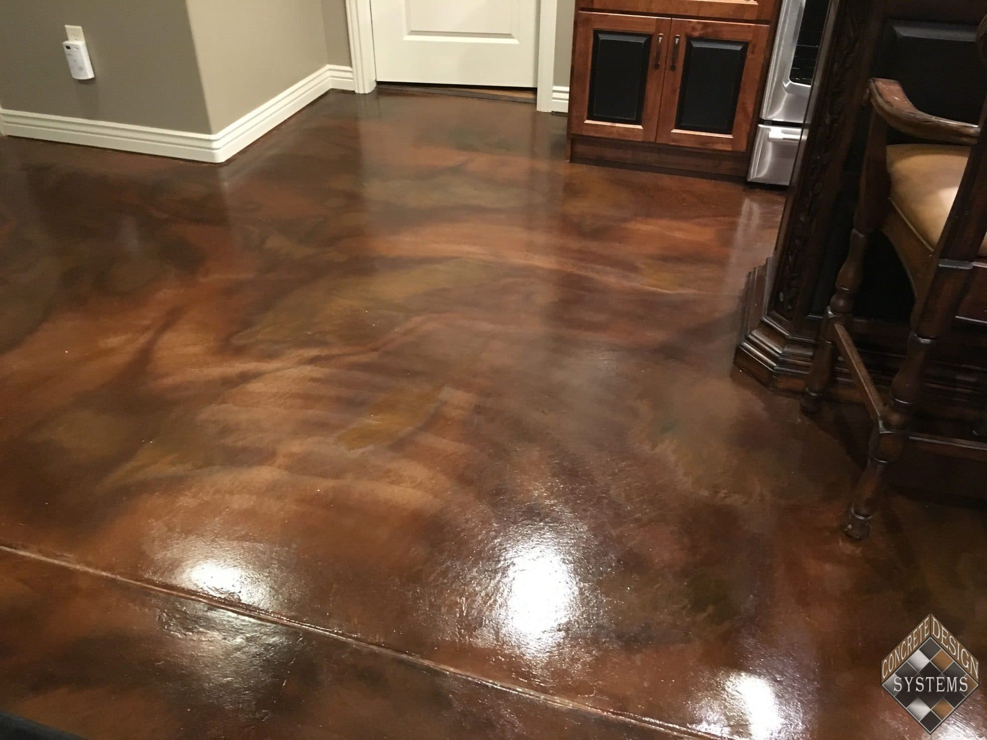 Walnut-Amber-Acid-Stained-Basement-Floor