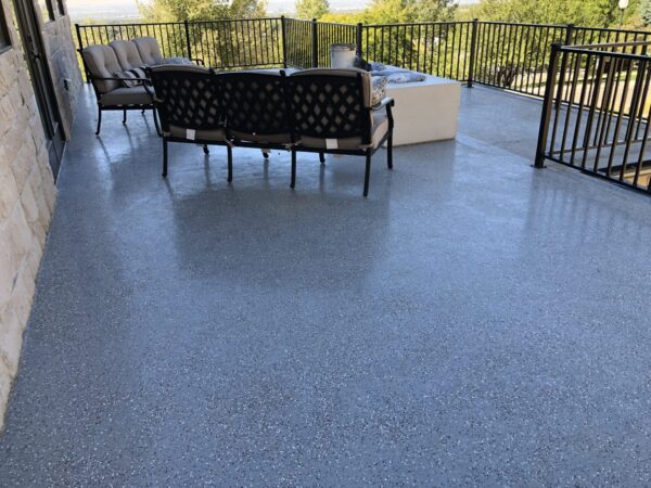 dolphin gray urethane waterproofing with color chips over a garage