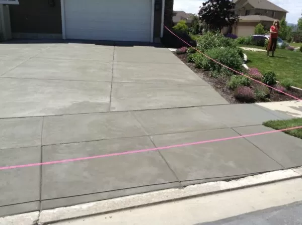 Resurfaced gray finished driveway service